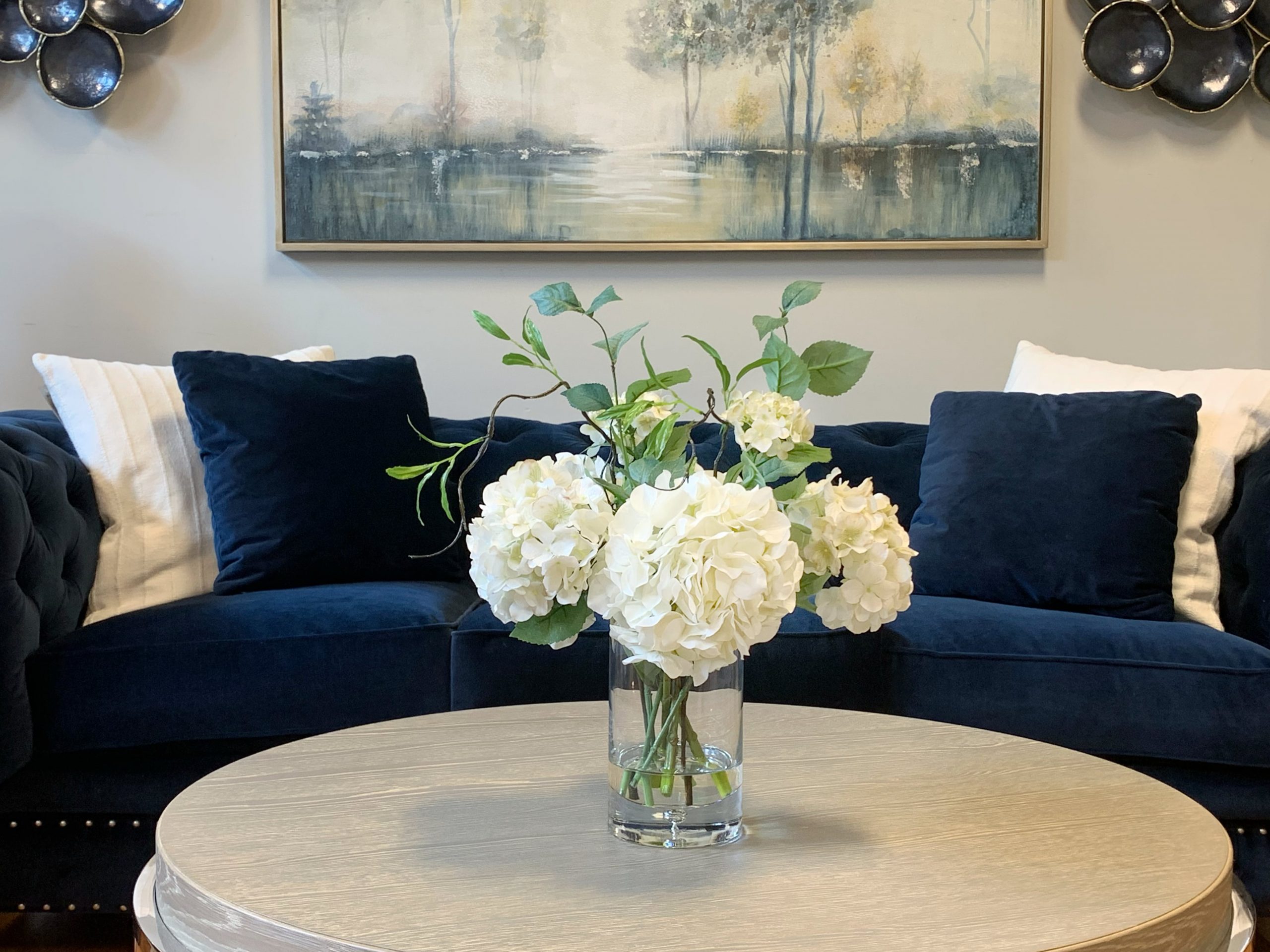 Creative Displays Cream hydrangea with curly vine arrangement in a glass vase