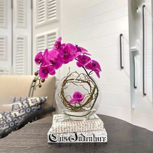 Orchid Arranged in Round Glass Vase with Vine