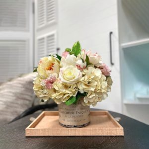 Rose and Hydrangea Arranged in Labeled Glass Vase