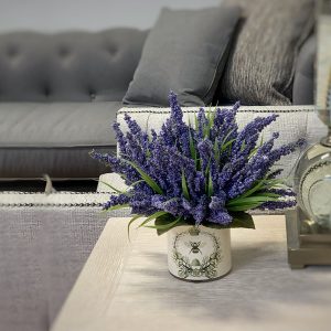 Heather Arrangement in Bee Labeled Glass Pot