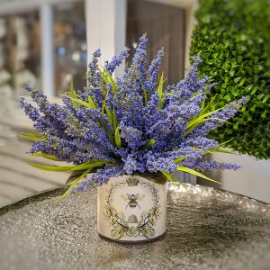 Heather Arrangement in Bee Labeled Glass Pot