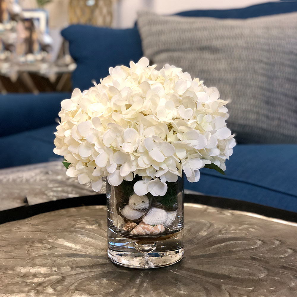 Creative Displays Floral Arrangement with Hydrangea, Shells and Moss in Clear Glass Vase