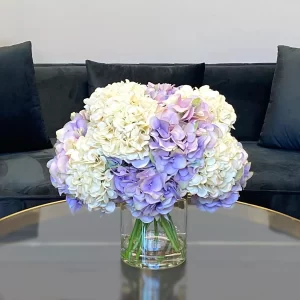 Assorted Hydrangea Floral Arrangement in a Clear Glass Vase