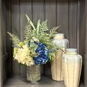 Assorted Hydrangea Arrangement with Mixed Fern in a Glass Pedestal Vase