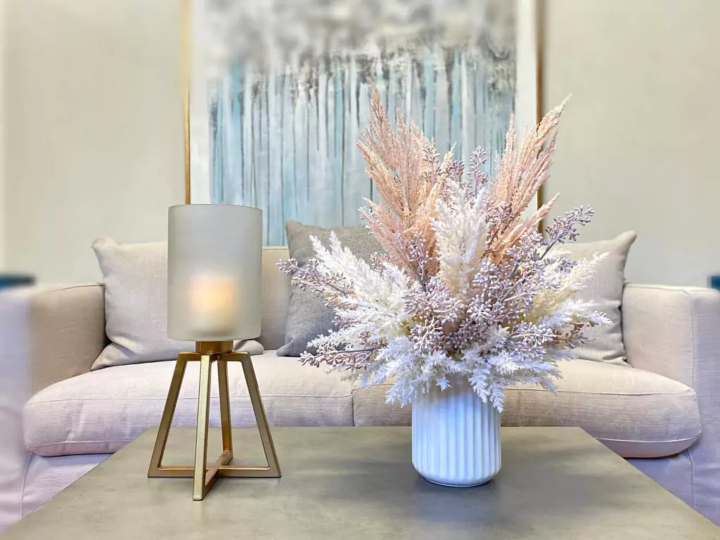 Pampas and Eucalyptus Arranged in a Ceramic Vase