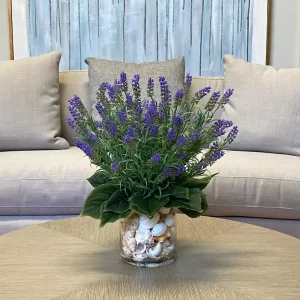 Lavender Floral Arrangement in a Clear Glass Vase with Seashells