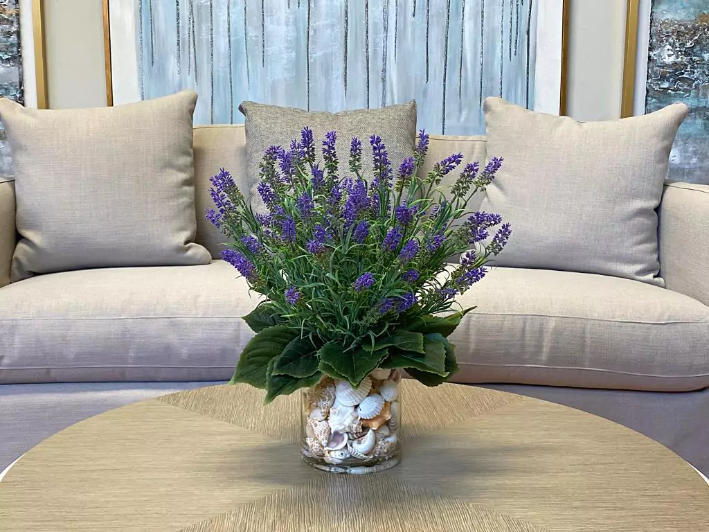 Lavender Floral Arrangement in a Clear Glass Vase with Seashells