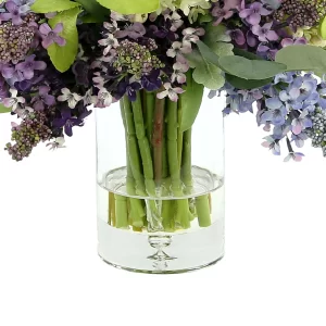 Lilac and Berry Floral Arrangement in a Clear Glass Vase