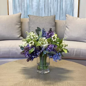 Lilac and Berry Floral Arrangement in a Clear Glass Vase - Image 2