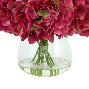 Hydrangea Floral Arrangement in a Round Glass Vase