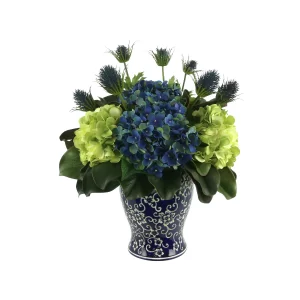 Assorted Hydrangea and Thistle Arrangement in a Decorative Ceramic Vase