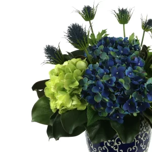 Assorted Hydrangea and Thistle Arrangement in a Decorative Ceramic Vase