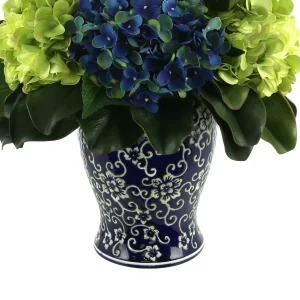 Assorted Hydrangea and Thistle Arrangement in a Decorative Ceramic Vase