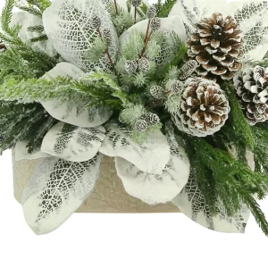 Magnolia Leaf Holiday Arrangement with Pinecones in an Oval Ceramic Pot