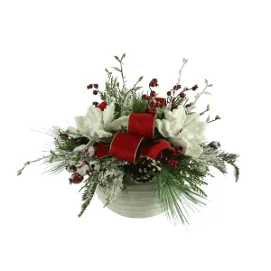 Holiday Arrangement with Magnolias, Snowy Greens and Berries in Ceramic Pot
